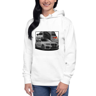 Female model wearing Hot Hatch Legends white hoodie with detailed car graphics inspired by the BMW M140i