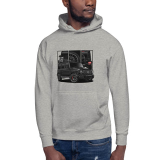 Male model wearing Luxury SUV Legends light grey hoodie with detailed car graphics inspired by the Mercedes G Wagon G63 AMG