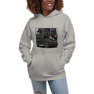 Female model wearing Hot Hatch Legends light grey hoodie with detailed car graphics inspired by the Mercedes G Wagon G63 AMG
