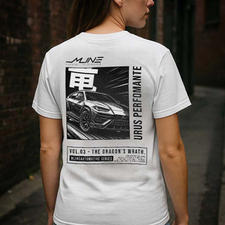 Lifestyle female rear, White → Female model wearing VOL.03 Dragon’s Wrath Lamborghini Urus manga t-shirt in white, back design