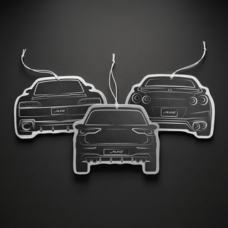 Three M Line Automotive silhouette car air fresheners displayed together in a premium flat lay on a dark background, showcasing the 3 pack bundle.