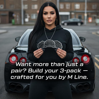 Woman standing in front of a Nissan GTR holding three M Line Automotive silhouette car air fresheners, highlighting the custom 3 pack bundle.