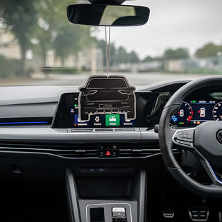 VW Golf R Mk8 Silhouette Air Freshener by M Line Automotive – hanging from rear-view mirror inside Golf cockpit, showing realistic fit and detail.