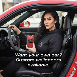 Custom car wallpaper shown on smartphone inside performance car interior