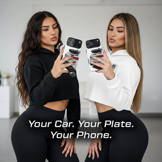 Two women holding personalised car phone cases with rear view tune art design